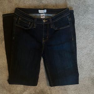 Like new dark blue jeans. Worn only a few times. Skinny at ankle .